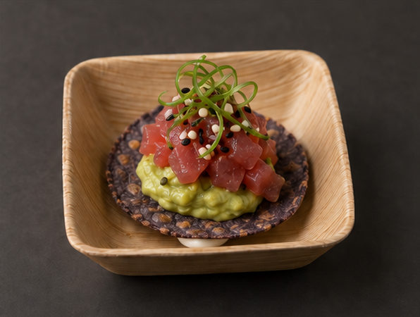 Presentation concept of a tuna and avocado tostada